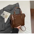 Chic vintage brown mini bucket bag with gold stud detailing and adjustable strap - Standard Type / Brown