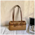 Minimalist canvas Boston bag in ginger yellow featuring brown leather decorative belt strap - Standard Type / Brown