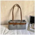 Grey textured Boston bag with brown leather handles and decorative belt buckle detail - Standard Type / Blue