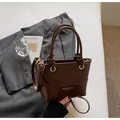 Deep brown leather bucket bag with top handle and knot detail in a vintage style - Standard Type / 21*8*15 / Brown