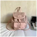 Lotus pink women's faux leather flap backpack with drawstring and textured paneling - Regular Fit / 26cmx11cmx26cm / Pink