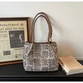 Brown woven tote bag with braided handles and abstract patterns for commuting style - Brown