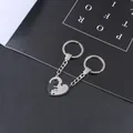 Portachiavi per coppie con gatti e cuore ad incastro in resistente acciaio inossidabile - Motivo Cuore Nero E Bianco Incastro