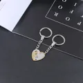 Set portachiavi gatto per coppie in acciaio inossidabile con ciondoli cuore oro e argento - Motivo Cuore Oro E Argento Incastro
