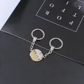 Set portachiavi coppia gatti oro e argento con ciondoli circolari a incastro - Portachiavi Rotondi A Forma Di Gatto In Oro E Bianco (coppia)