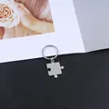 Minimalist stainless steel puzzle piece keychain for couples with polished silver finish - Concave Puzzle