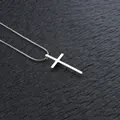 Collana con ciondolo a croce in acciaio lucido e catena a serpente su pelle scura - Croce + Catena a Serpente 50+5