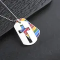 Macro view of double-layered stainless steel tag pendant with cross and rainbow stripes - Cross Rainbow Style with Round Bead Chain