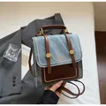 Mini zaino vintage in denim blu con finiture in pelle marrone e fibbie metalliche dorate - Senza Ciondolo / Blu