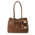 Vintage dark brown tote bag with decorative straps and a cute bear charm on white background - With Pendant / Brown