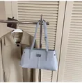 Light blue faux leather tote bag with silver logo plate and adjustable shoulder straps - 34*11*18 / Blue