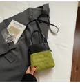 Chic black leather and olive green suede bucket bag with quilted patterns and dual straps - Green