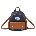 Mini sac à dos en jean bleu marine avec finitions en cuir marron et patch ours - Bleu Denim