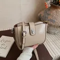 Beige faux leather crossbody bag with silver twist lock and adjustable shoulder strap - 22*7*15 / Khaki