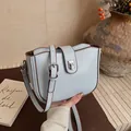Light blue faux leather crossbody bag with subtle texture and silver metallic buckle - 22*7*15 / Blue