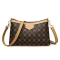 Women's brown crossbody bag with classic diamond pattern and caramel strap on white background - Brown