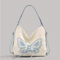 Weißer Schmetterling Rucksack vielseitige Schultertasche mit blauen Schleifen Details - Weiß