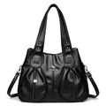 Sac fourre-tout noir élégant avec texture litchi, doubles poignées et bandoulière - Noir