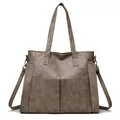 Retro taupe soft leather tote bag with dual front pockets and adjustable shoulder strap - Camel