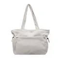 Bolso tote grande de pana blanco roto con rayas verticales y bolsillo frontal - Blanco Roto