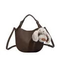 Dark brown pebble leather bucket bag with top handle and plush rabbit pendant - Coffee With Pendant