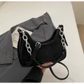 Black crescent shoulder bag with silver chain strap and matte suede texture finish - Black