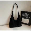 Minimalist black matte leather hobo bag with sleek shoulder strap for daily commuting - Simple Style / Black