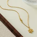 Elegante collana in acciaio al titanio dorato con ciondolo a fiocco di neve e catena - Oro