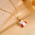 Detail of a gold necklace featuring a colorful rocket pendant with a jeweled crown on stone - Gold - Snowman