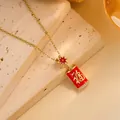 Detailed close-up of red enamel firecracker pendant with gold Fu character and crystals - Gold - Fu Firecracker