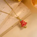 Gold stainless steel Christmas tree necklace with red enamel and sparkling crystals - Gold - Red Christmas Tree