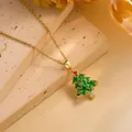 Detail of gold Christmas tree necklace with green enamel and sparkling crystals - Gold - Green Christmas Tree