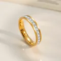 Macro view of gold plated titanium steel ring with channel set row of sparkling zircon stones - Size 5 / Eternity Row Diamond Ring / Gold