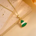 Detailed view of a festive golden Christmas tree pendant with green and white enamel finish - Gold - Green and White Christmas Tree