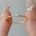 Minimalist 18k gold plated titanium ring with hammer texture and sparkling center zircon - US 5 / Gold