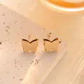 Detail of butterfly earrings in rose gold finish with matte and polished textures - Butterfly Ear Stud (ED3011M) / Rose Gold