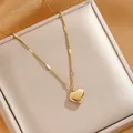 Golden heart necklace with Love engraving on champagne satin jewelry display box - Heart Necklace / Gold (XL8077J)