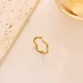 Macro shot of minimalist gold wave-shaped stainless steel ring with polished surface - Size 5 / Thick Wave Style (JZ1015J) / Gold