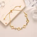Hollow four-leaf clover bracelet in 18k gold-plated steel with adjustable drawstring - Hollow Clover Drawstring Adjustable Style (SL5070J) / Gold
