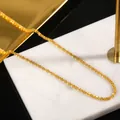 Elegant 18k gold plated titanium steel star necklace on a white marble display - Necklace / 18K Gold