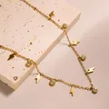 Detail of 18k gold plated titanium necklace with lightning pendants and cubic zirconia - Lightning Style (XL8151J) / Gold