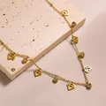 Macro detail of 18k gold plated titanium necklace with clover and diamond pendants - Diamond Style (XL8157J) / Gold