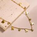 Λεπτομερής όψη χρυσού κολιέ 18k με πεταλούδες και ζιργκόν σε πέτρινη βάση - Στυλ Διάτρητη Πεταλούδα (XL8162J) / Χρυσό