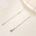 Detail of silver box chain necklace featuring a lobster clasp and adjustable link chain - Box Chain / 40+5cm / Steel