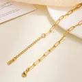Detail of gold paperclip chain necklace with lobster clasp and S.STEEL engraved tag - Paperclip Chain / 40+5cm / Gold