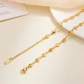 Close-up of gold plated stainless steel heart link chain with S.STEEL engraved tag - Heart Tag / 40+5cm / Gold