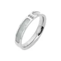 Detailed close-up of white shell inlay and triple zircon stones on a steel ring - Size 11 / Steel