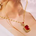 Elegant gold titanium necklace featuring a large emerald-cut red gemstone pendant - Ruby Red Zirconia (Lip Chain) / Gold