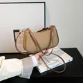 Retro khaki canvas shoulder bag with brown leather trim and adjustable strap - Khaki