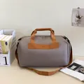 Borsa da viaggio grigio Morandi con separazione asciutto umido e manici marroni - Grigio